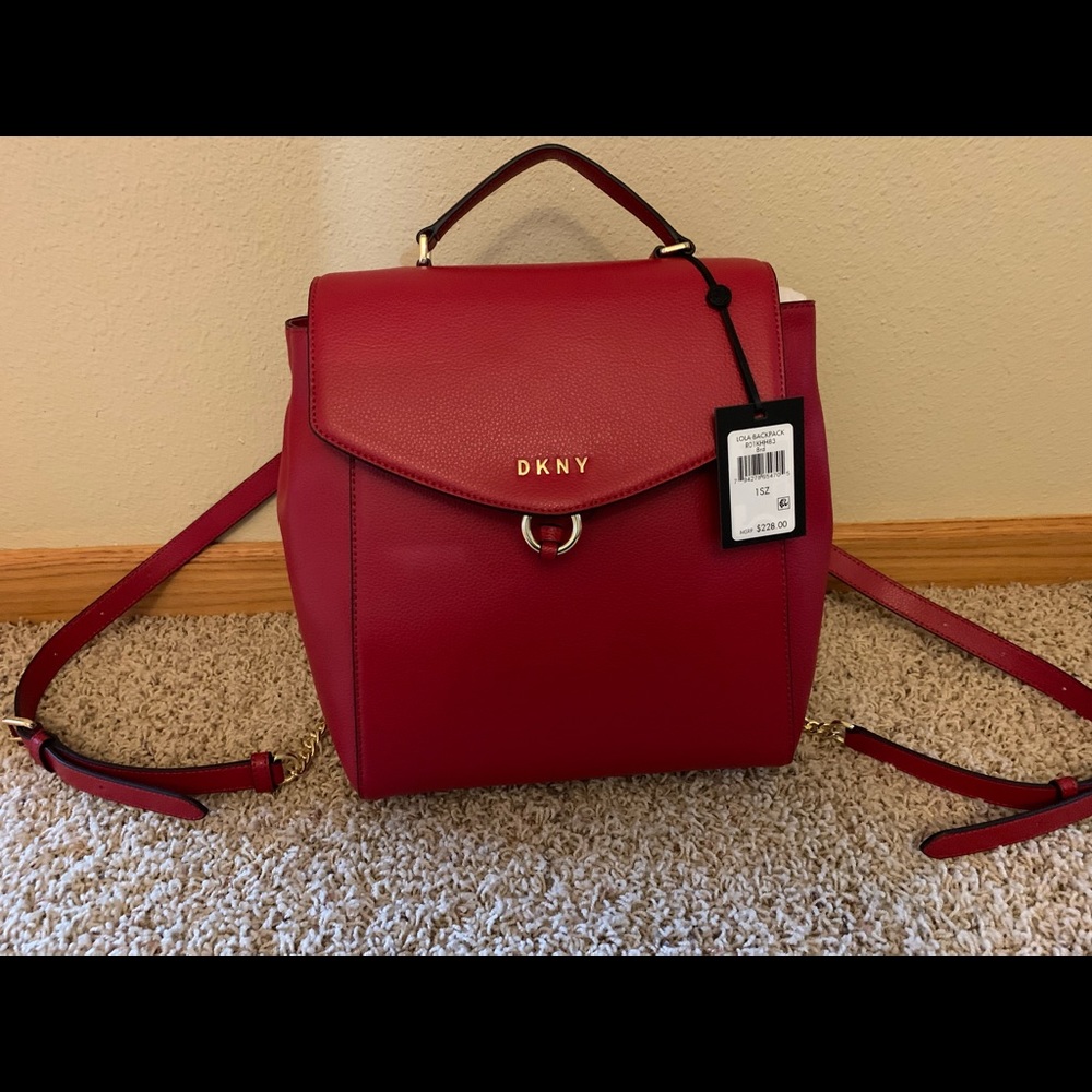 DKNY red faux leather backpack.